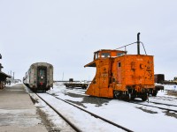 <b> 167 and counting </b> <br>
VIA 693 is backed in on track ZC41 the station track at Churchill, MB while HBRY 55376 (ex-CN 55376) single track snowplow rests on the mainline at End of Subdivision in Churchill Yard. <br>
The trailing passenger car in VIA 693's consist is VIA 8224 Chateau Roberval sleeper built in November of 1954 making it 71 years old. <br>
HBRY 55376 (ex-CN 55376) was built in March 1930 making it 96 years old! <br>
As witnessed on my recent trip to Churchill, both are still functioning as intended when built new, with a total accumulated years of service of 167+. <br>
Both are clearly showing their age, the Chateau sleeper on the inside, and the snowplow on the outside. <br>
I hope to catch them both several more times on future trips. <br>
At the rate they are going, it would appear both pieces of equipment will outlast me!