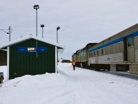 <b> Heading back to the cab </b> <br>
It's early morning in Ilford, MB where VIA 692 the southbound passenger train from Churchill has made its scheduled stop. <br>
Passengers are all boarded, baggage has been loaded, and as the baggage car door slides closed the second engineer makes his way back to the locomotive to continue the trek towards Winnipeg. <br>
Ilford is just one of the many remote locations where this VIA lifeline train stops along the 1,024 km (636 mile) route.