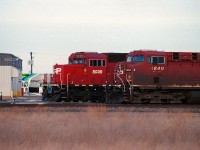 Canadian Pacific 8840 waiting for clearance to depart Kipp Yard, while Canadian Pacific 5039 and another engine switch tankers around the yard while one of the CPKC hydrogen units hide's behind the repair shop.