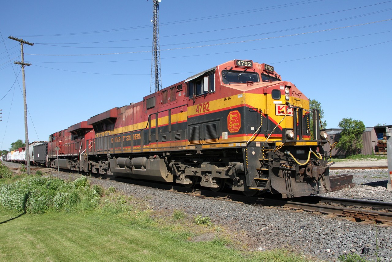 Slowly headed eastward along the Galt Subdivision, 4792, a GE ES44AC was being assisted by a CP GE ES44AC, 8751 as they come through the the famous CN CPKC diamond in London Ontario.