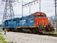 While CN’s surviving GP9RM’s get most of the attention these days, the surviving GTW GP9R’s deserve just as much attention. While they spend most of their time States side, a few have made their way north of the border to help fill in where needed. Originally built as a high short hood GP9 and utilized on both the GTW and CV , it years later was sent to undergo the GP9R rebuild program. In the process it received a new cab and short hood as well as relocated air tanks along with many other modifications. While several have been repainted in CN paint, others like 4623 retain their GTW blue and red. Unfortunately today it spent the day in trailing position on local 542 but at least allowed me one opportunity to catch it not nose coupled as it switched out the shared Guelph North spurs. 