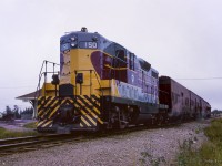 Algoma Central Railway train 2, running southbound from Hearst to Sault St. Marie, pauses at CN's Oba station.

<br><br><i>Scan and editing by Jacob Patterson.</i>