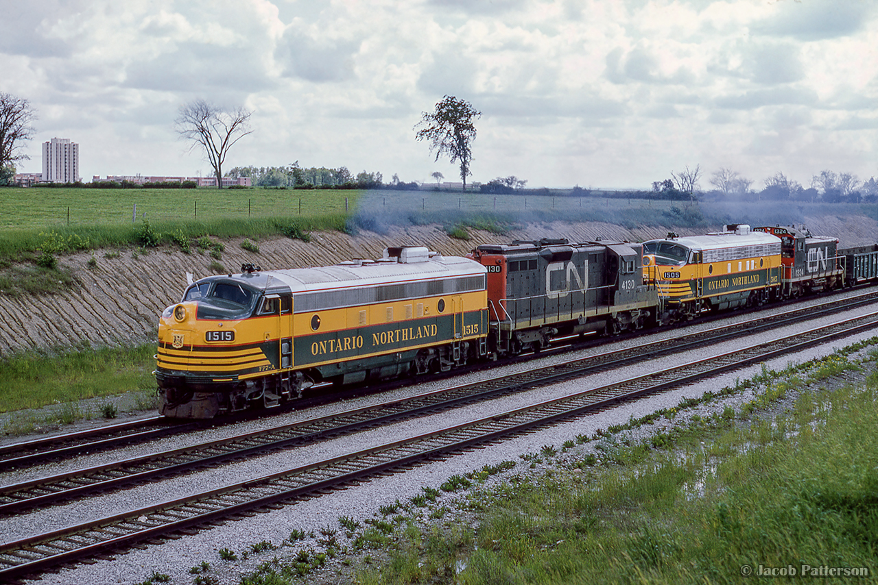 Departing Toronto Yard, Extra ONR 1515 approaches Keele Street and the junction at Snider, where it will take the Newmarket up to North Bay.

Scan and editing by Jacob Patterson.