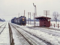 Rolling eastbound into Agincourt Yard, Extra B&O 4487 (class lights lit) approaches the north platform at <a href=https://www.trha.ca/history/stations/agincourt-station-canadian-pacific-railway/>Agincourt station</a> with a short cut of autoracks.  Taken in mid-late February, the lease of B&O F units began only just before this <a href=https://www.railpictures.ca/?attachment_id=29413>on February 10, 1972.</a>

<br><br>More information on the leae of B&O F units <a href=https://www.waterlooregionmodelrailwayclub.ca/2022/10/bo-f-units-in-twilight/>can be found here.</a>

<br><br><i>Scan and editing by Jacob Patterson.</i>