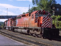 An eastbound freight rounds the curve rolling into Kenora.

<br><br><i>John Freyseng Photo, Jacob Patterson Collection Slide.</i>