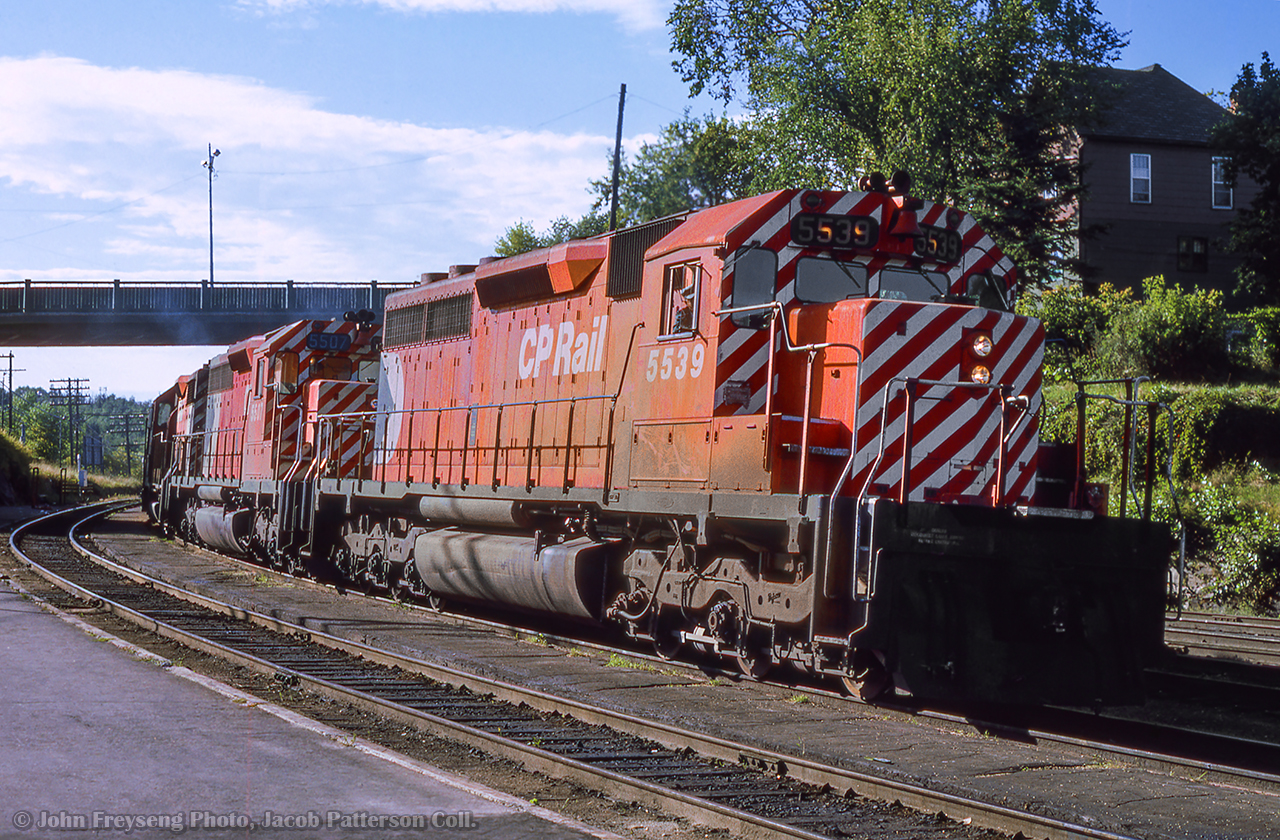 An eastbound freight rounds the curve rolling into Kenora.

John Freyseng Photo, Jacob Patterson Collection Slide.