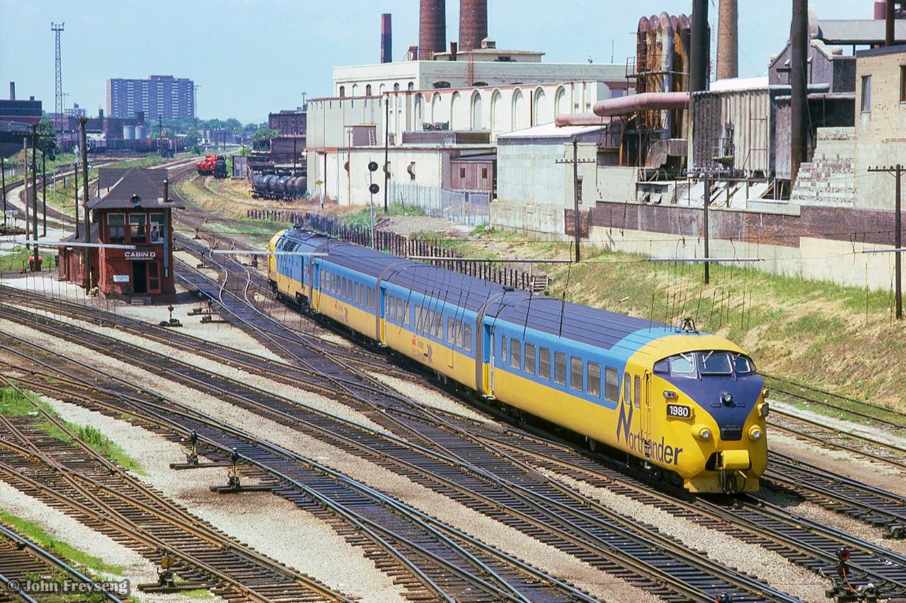 Headed for the Newmarket Sub and on to northern Ontario, ONR's Northlander rolls by Cabin D, and the west end of Toronto Terminal Railways territory.

Scan and editing by Jacob Patterson.