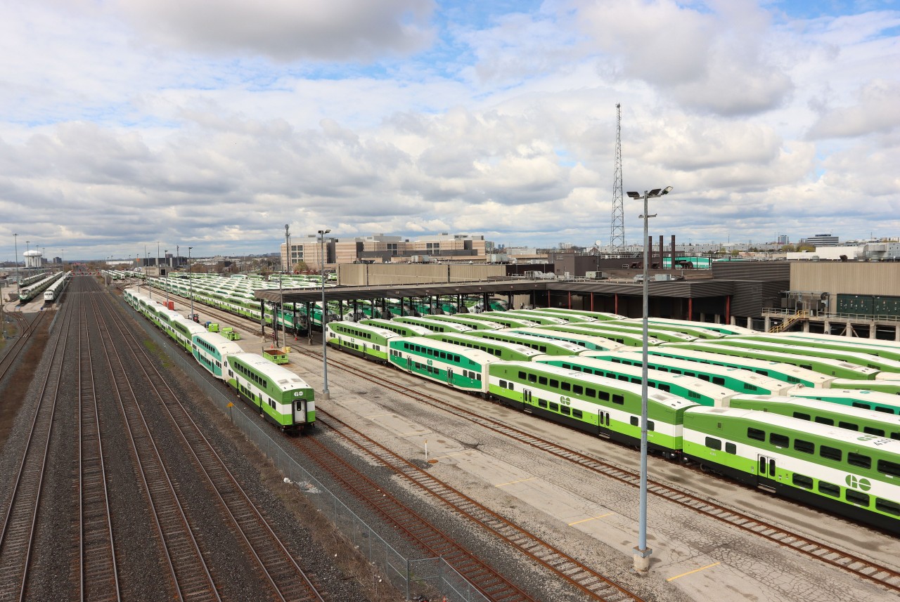 The morning equipment runs to the GO Willowbrook Maintenance Facility are complete, the shop tracks and servicing facilities are full up. Time to service and prepare the equipment for the afternoon trips. The GO Mimico South Layover Facility can be seen on the south side of the Oakville Sub..