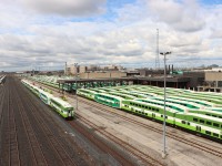 The morning equipment runs to the GO Willowbrook Maintenance Facility are complete, the shop tracks and servicing facilities are full up. Time to service and prepare the equipment for the afternoon trips. The GO Mimico South Layover Facility can be seen on the south side of the Oakville Sub.. 