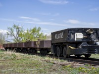 The only battery electric locomotive still running at the historic Atlas Coal Mine in Drumheller. Here, the #3 is sitting with a string of cars waiting for their next load of passengers. 