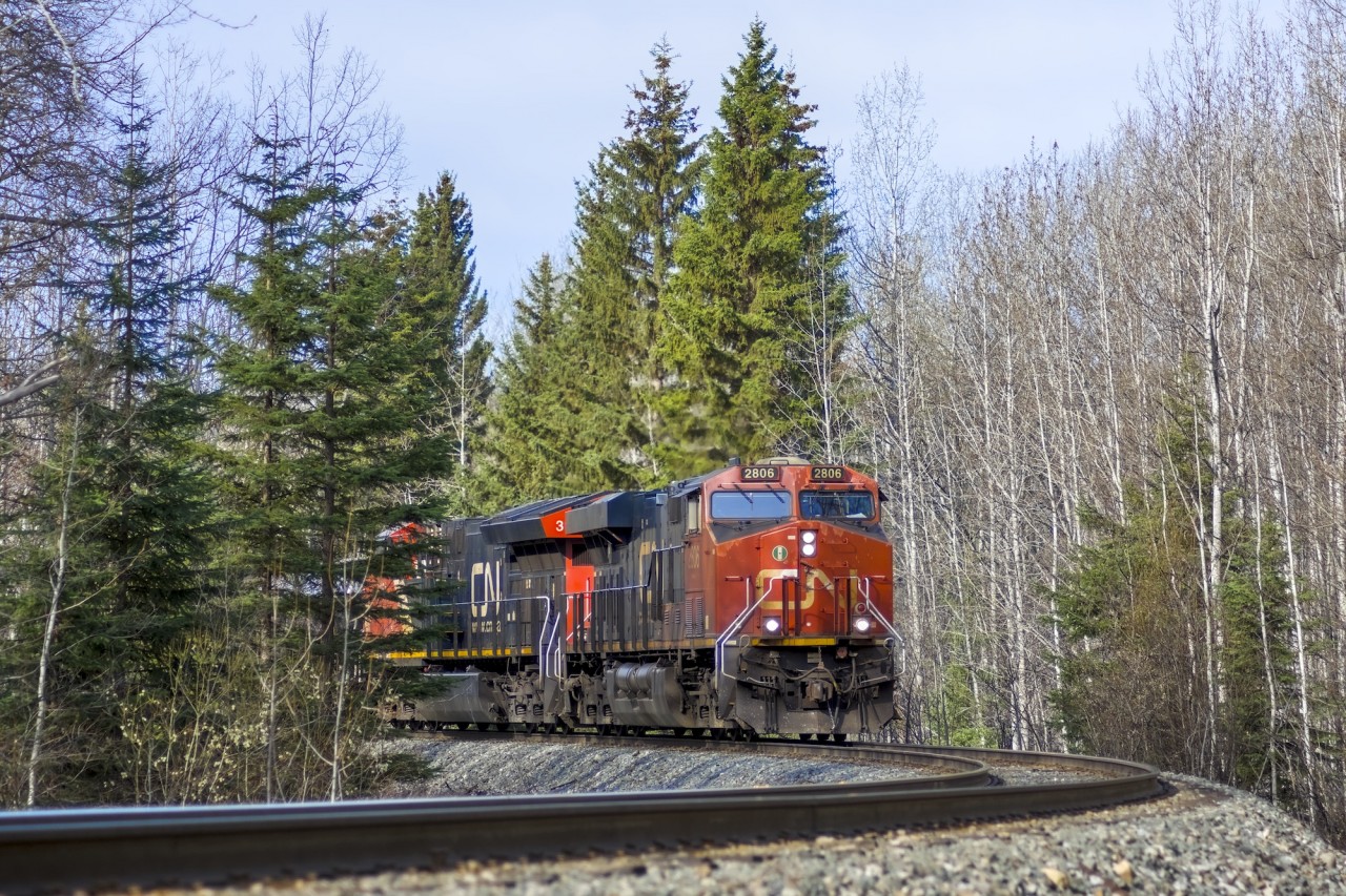 CN 2806 leads a northbound manifest train towards Fort St John in some great morning light.