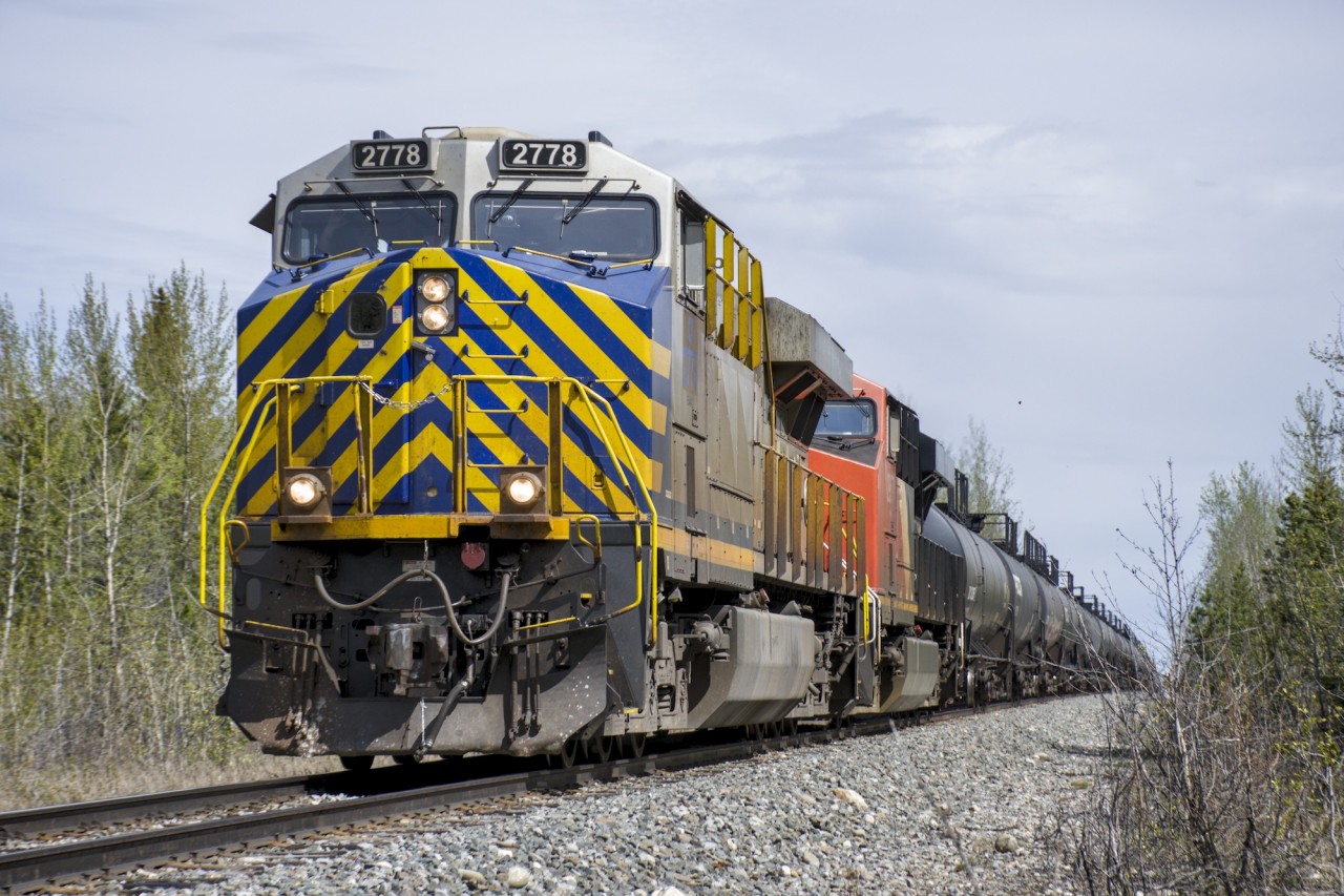 CN L57551 is almost at the end of it's trip. This train is loaded, and will likely head down to the coast. This unit is most likely going to get painted in CN colors and re-numbered, so it is neat to catch them while you can!