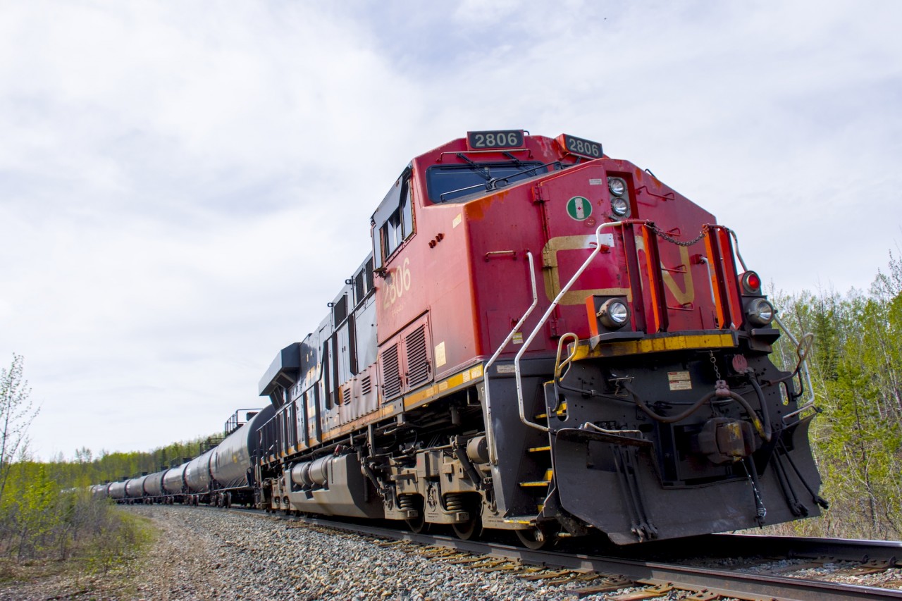 CN 2806 shoves on the rear of CN L57551 as it heads into Chetwynd.