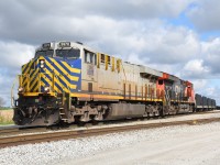 CN 502 is seen doubling their train away in Southern Ontario Railway's Garnet Yard. It's always nice to get a ex. Citirail locomotive leading, and the sun even co-operated... before the snow flurries... in May. Behind the locomotives was a cut of CSXT steel slab cars that I had never seen on 502 before. Hopefully some new business for Stelco. 