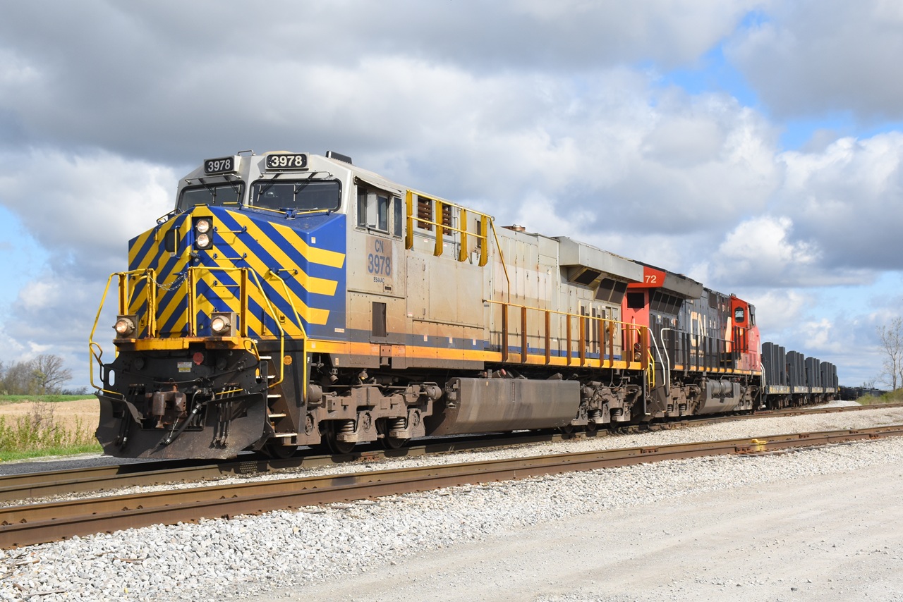CN 502 is seen doubling their train away in Southern Ontario Railway's Garnet Yard. It's always nice to get a ex. Citirail locomotive leading, and the sun even co-operated... before the snow flurries... in May. Behind the locomotives was a cut of CSXT steel slab cars that I had never seen on 502 before. Hopefully some new business for Stelco.