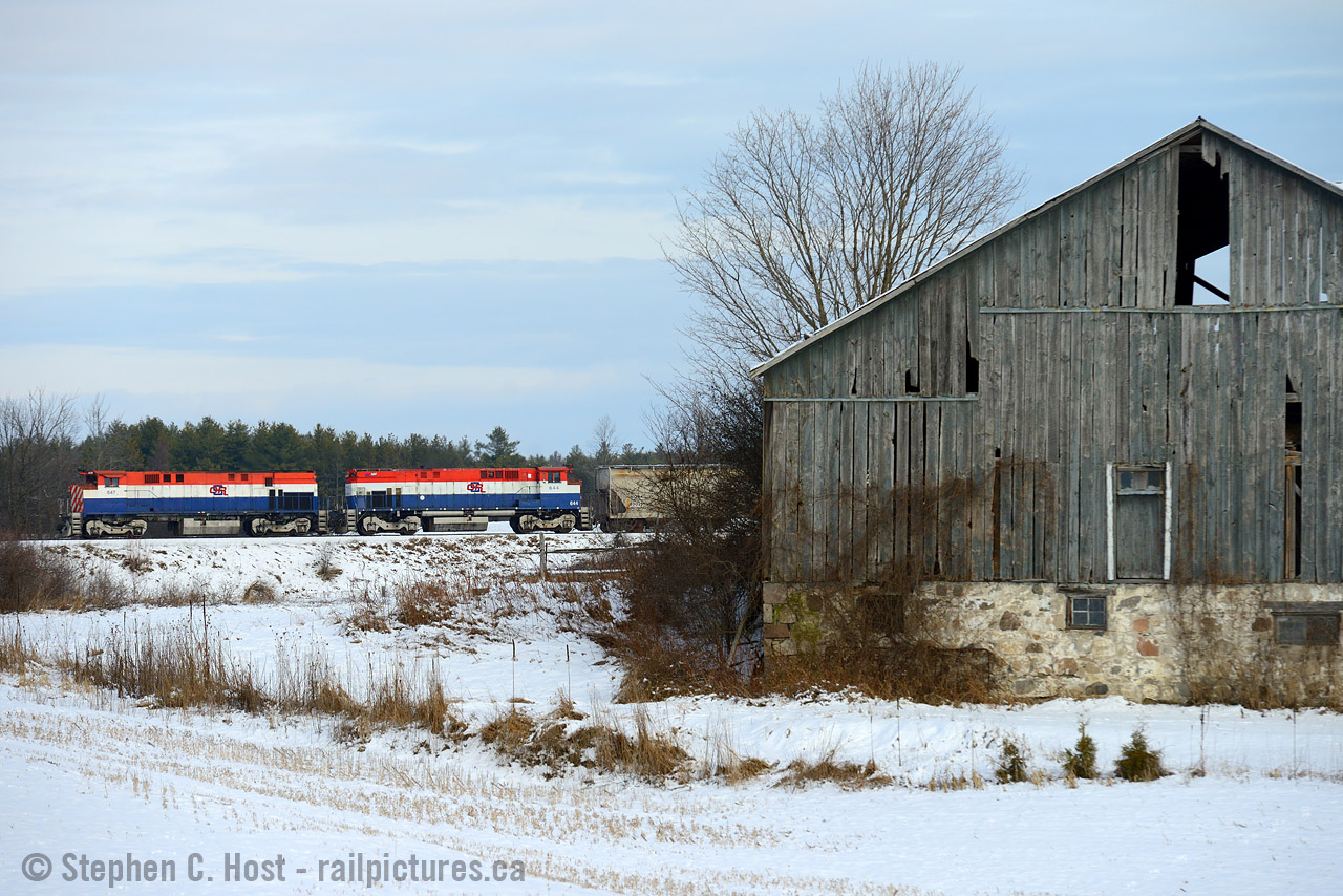 One of the OSR Guelph Division engineers Manley Johnson preferred Alco/MLW's. He also preferred this pair. Pictured is Job 2 heading North in the early afternoon, passing a farm located between Corhwin and Arkell on the Guelph Junction Railway. This day the boys will run straight to the CN interchange and north end of Guelph, by the time they arrive in the north end of town, the sun would come out.

I had missed the BC Rail era - didn't make it out west before they sold to CN. What BC Rail scheme do you guys enjoy the most? What I find the most striking is the Erie Lackawanna did this scheme first. Was it a 1776-1976 thing or something else?