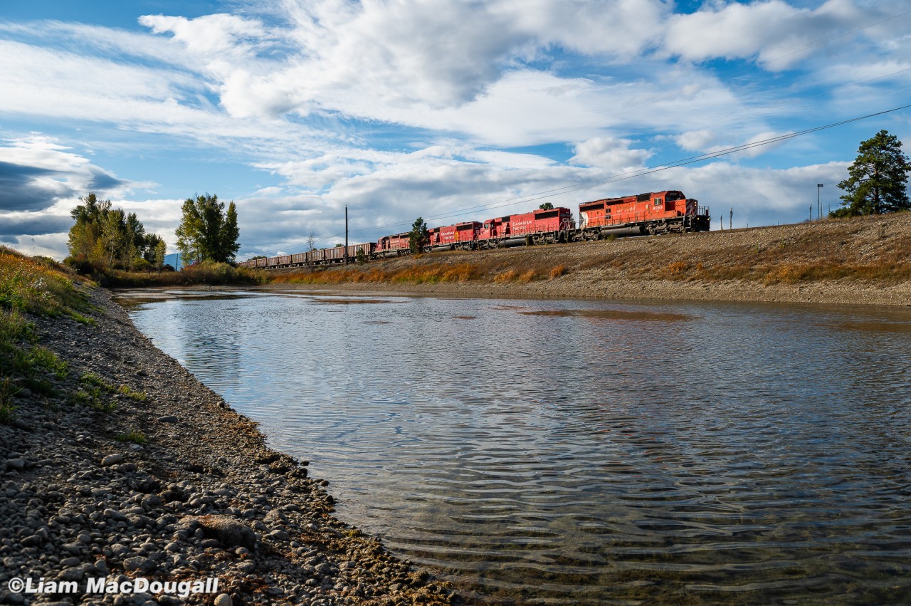 CP 6069 leads 3 other standard cab EMDs on a freshly loaded Herzog train from Swansea as they drop rocks on the Windermere Subdivision heading north out of Fort Steele.