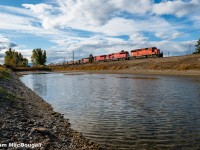 CP 6069 leads 3 other standard cab EMDs on a freshly loaded Herzog train from Swansea as they drop rocks on the Windermere Subdivision heading north out of Fort Steele.