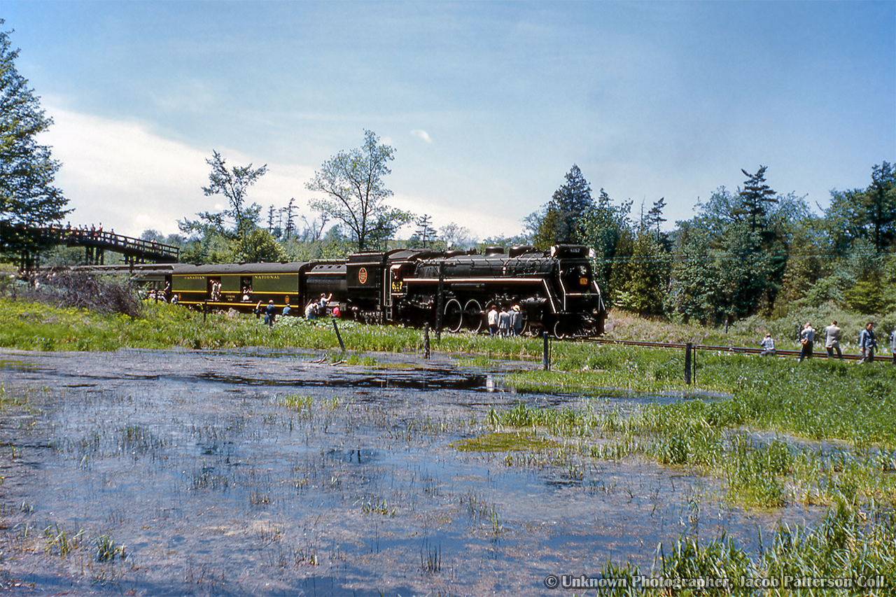 CNR 6167 is seen backing along the Fergus Sub for a runpast just west of Branchton.  This excursion, operated by the Upper Canada Railway Society, was operated Toronto - Guelph - Galt - Lynden - Brantford - Paris - Caledonia - Hamilton - Toronto.

Original Photographer Unknown, Jacob Patterson Collection Slide.