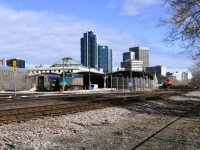 <b> The Shed </b> <br>
At the left of the frame, VIA 6419 and unidentified VIA passenger car (VIA 8109 economy coach I think) sit partially under the canopy of the Winnipeg train shed, while at the right, stalled CN 3884 sits on one of the shed bypass tracks. <br>
The stalled freight caused an hour and a half delay in the departure of VIA 693 The Churchill train which gave me time for a few more photos and lunch at The Forks Market behind Union Station. :-)