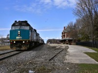 <b> The train still stops here </b> <br>
Even though the two tracks in front of the station are out of service or torn up, VIA 693 and VIA 692 the trains to and from Churchill, MB still make a scheduled stop at Dauphin, MB. <br>
VIA 692 is pictured here during its return trip from Churchill to Winnipeg on a beautiful May 2, 2026 afternoon. <br>
Passengers have the opportunity for a leg stretch, some fresh air, and a quick visit to the Dauphin Rail Museum located inside the majestic station building. <br>
The station was built in 1912 by the Canadian Northern Railway to a design by architect John Schofield. It was designated a Heritage Railway Station of Canada in 1990. <br>
The consist for VIA 693/692 on my recent trip was <br>
VIA 6421 F40PH-2 locomotive <br>
VIA 6455 F40PH-2 locomotive <br>
VIA 8602 baggage car <br>
VIA 8100 economy coach <br>
VIA 8122 economy coach <br>
VIA 8503 Skyline dome <br>
VIA 8224 Chateau Roberval sleeper 

