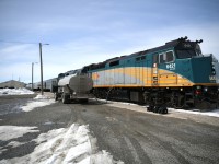 <b> Takin' on some juice </b> <br>
VIA 692 has backed into the station at Thompson, MB for its regular scheduled stop. <br>
Passengers have a few hours to mill about the station and surrounding area, go into town for a walk and maybe a little Walmart shopping, or wait in the parking lot for a driver to show up with pre-ordered restaurant food from one of the many local beaneries. I chose to get a large 'all meat' pizza from Santa Maria Pizza which was delivered quickly and was still hot as it was enjoyed in the dining area of the Skyline Car. <br>
The head-end crew is in the process of changing out for a fresh team of engineers as a local diesel fuel supplier has the nozzle in place and is topping up the tanks on VIA 6421 and VIA 6455. <br>
All of the VIA personnel were very accommodating in my efforts to get all the head end shots I wanted at every stop made along the way from Winnipeg to Churchill and return. :-) <br>