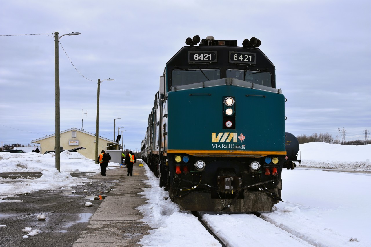 Another trip in the books  
VIA 693 has backed into the station at Thompson, MB and the head end crew has collected their belongings and make their way down the platform to the station where they will hand over control of the train to the new team of engineers. 
There is still a tremendous amount of snow on the ground for the end of April which has raised concerns about the amount of water that will be produced when it all melts. 
This concern became reality a week later when VIA 692 was stranded in Churchill for several days due to washed out sections of track on the HBR mainline.