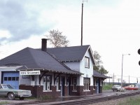 <br>
<br>
That VIA sign is encouraging,
<br>
<br>
Daily VIA Budds 619 & 620 (Moncton - Edmundston) served until the November 1981 service cuts, wherein Trudeau's Liberal Federal Transport Minister Jean- Luc Pepin chopped VIA's budget in half.  
<br>
<br>
at Saint Leonard N.B., mile 194 CN Napadogan Sub-Division, June 10 1981 Kodachrome by S.Danko 
<br>
<br>
After the November 1981 train offs, VIA service was restored by Progressive Conservative Federal Transport Minister Don Mazankowski  October 1984 with VIA tri weekly Budd car trains 625, 626 & 628 that survived unit the massive January 1990 VIA cuts orchestrated by Progressive Conservative P.M. Brian Mulroney's chopping crew lead by Fed Transport Minister Benoit Bouchard.
<br>
<br>
Note the jointed rail,
<br>
<br>
And The Parisienne Atlantica parked behind the light standard.
<br>
<br>
sdfourty