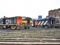 CN 3106 and other locomotives are around the turntable at CN's Spadina engine facility in Toronto on June 13, 1972.