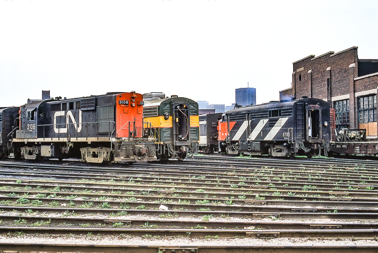 CN 3106 and other locomotives are around the turntable at CN's Spadina engine facility in Toronto on June 13, 1972.