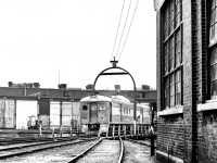 CN 6401 is in what I believe to be the CN Spadina engine facility in Toronto in the late 1960's/early 1970's.