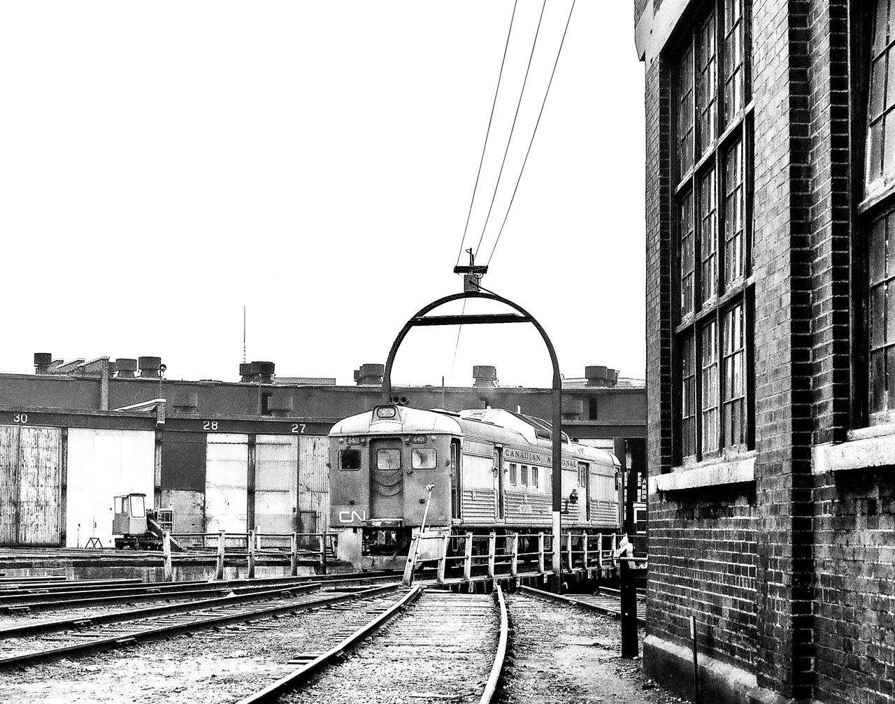 CN 6401 is in what I believe to be the CN Spadina engine facility in Toronto in the late 1960's/early 1970's.