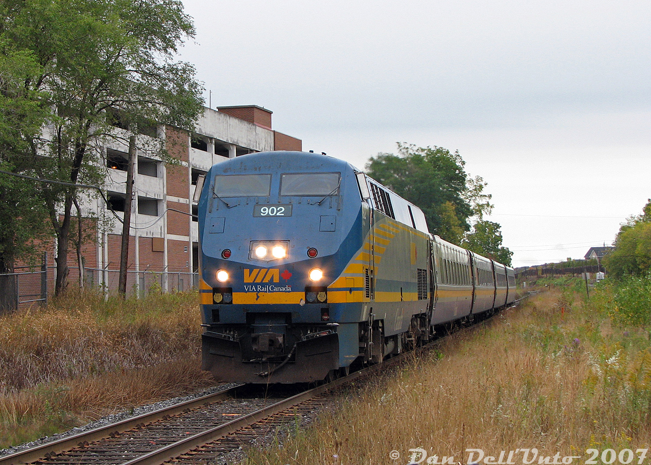 Weston wasn't exactly a hotspot for train watching back in the day (much less so now with the Metrolinx trench), but what ran was predictable and easy to catch if one knew what ran when. VIA #84 puts in its daily afternoon appearance, galloping through Weston on the final stretch to Toronto Union Station downtown after its previous stop in downtown Brampton (no VIA service for the residents of Weston!). VIA P42DC 902 leads 4 LRC cars, approaching John Street and the GO station after just crossing Church St. (this was a typical #84 consist for the time, as unlike #85/88 where the F40's ruled with an iron fist, #84/87 could pull either an F40 or a P42 from the deck).