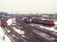 There are times, like today, when I look at photos of Niagara Falls CN yard (or Fort Erie, for that matter) and wonder where all the traffic has gone. Such a busy yard. On the left rolling over the main line is #331 with CN 2427 and 2407 the power.  At least I know the demise of the 2400s on CN.............