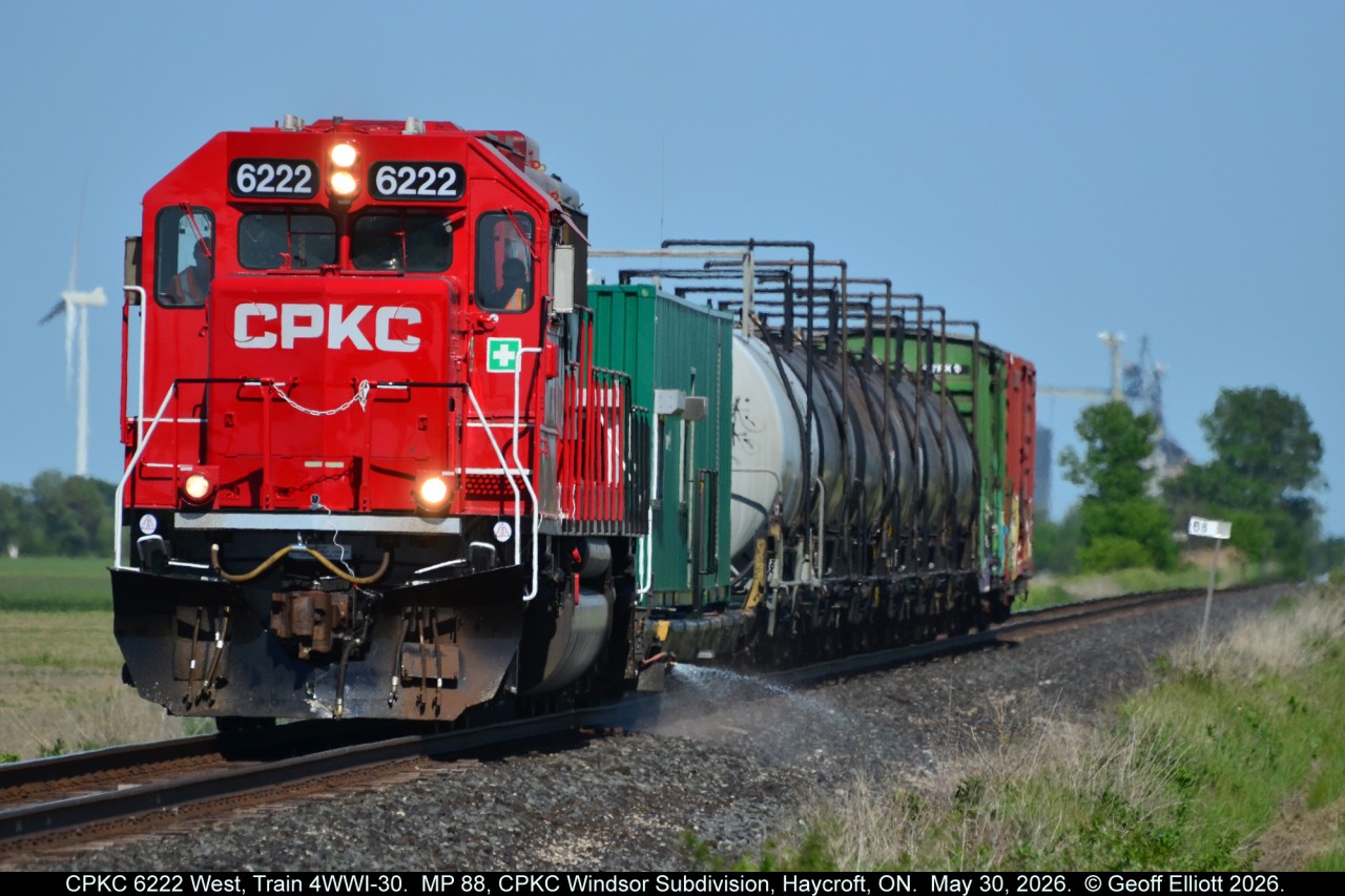 It's that time of year again.  Time to spray the weeds along the CPKC Windsor Subdivision.  After sitting in London for 3 days CPKC SD60 #6222, with Train 4WWI-30, finally made it's way toward Windsor to take care of those pesky weeds.  Here 6222 is at MP 88 of the CPKC Windsor Subdivision, just west of Haycroft, Ontario (where the mill in the background resides).  Personally, based on the vegetation along the ROW, I think they are spraying fertilizer b/c it always seems to get worse after they do this each year, but it's nothing that a good hand sickle and a little time can't fix.  :-)