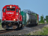 It's that time of year again.  Time to spray the weeds along the CPKC Windsor Subdivision.  After sitting in London for 3 days CPKC SD60 #6222, with Train 4WWI-30, finally made it's way toward Windsor to take care of those pesky weeds.  Here 6222 is at MP 88 of the CPKC Windsor Subdivision, just west of Haycroft, Ontario (where the mill in the background resides).  Personally, based on the vegetation along the ROW, I think they are spraying fertilizer b/c it always seems to get worse after they do this each year, but it's nothing that a good hand sickle and a little time can't fix.  :-)