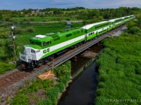 GOTX 560 in the lead of CN P30031 11, cab car GOTX 206 on tail end, transporting refurbished GO Transit equipments from North Bay back to Willowbrook yard with ONR crew operating. (2026/06/11)