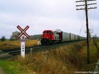 CN SD40 5036 crossing the CP/CN Diamond at Melrose.