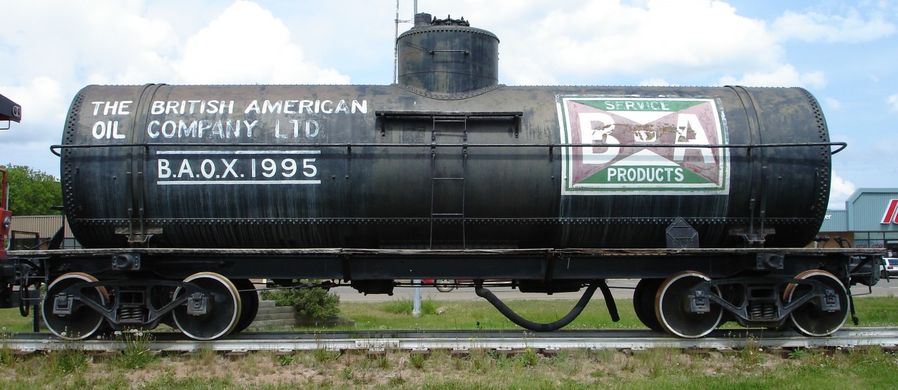 100 years old!  
Built 100 years ago in 1926, BAOX 1995 now sits on static display in the town of Redwater, AB. 
While working in town with some new MoW Work Equipment I took some time to walk around and snap a few pics with this preserved tank car being one of them.