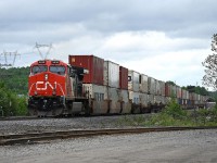 After waiting for the better part of half an hour for VIA Number 2 to make its station stop at Sudbury Junction, this northbound intermodal finally gets moving again.  VIA Number 2 had backed up to the north switch where it entered the siding to continue its southward journey to Toronto.  
The freight had the 3430 leading and mid train DPU 2912.