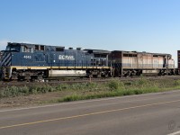 The 4645 and 4617 slip past Clover Bar as they take a train of containers into Edmonton. Time was 7:45 on a sunny June morning.