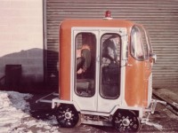 <b> Futuristic look, high-tech track motor car, 1970 style </b> <br>
CN 999-82 is a 2-man inspection track motor car with experimental welded aluminum chassis and fiberglass cab with bi-fold aluminum doors. <br>
An attempt to make the conventional track motor car a little more 'user friendly' with lightweight aluminum frame, fully enclosed operator compartment, front windshield wipers, headlight, red flashing roof beacon, and west coast mirrors. <br>
The car as shown did not get purchased in any quantity by CN at the time, but it helped lead the way to continued improvements in future track motor car construction, safety, and crew comfort. <br>
Photo taken at the Danforth Work Equipment shop located at the rear of 2314 Gerrard St. East Toronto, ON which is now a cluster of town homes. <br>
<b> http://www.railpictures.ca/?attachment_id=42224 </b>