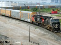 CN train 301 is viewed departing MacMillan Yard in Vaughan, Ontario with CN’s Illinois Central heritage unit 3008 leading and 3307 trailing. 