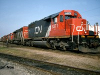 CN 431 with SD40-2 5371, SD40 5142 with GP9RM’s 4137 and 4138 are pictured in the yard at Kitchener, Ontario. The crew had just completed their set-off and were in the process of uncoupling 4138 as well. GP9RM 4137 would possibly be set-off at Stratford or continue on to London Jct. 