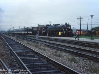 Operating on a fantrip to Peterborough, CNR "Bullet-Nose Beatty" 6060 pauses at Scarborough Junction for a photo-op, before leaving the CN Kingston Sub for the Uxbridge Sub and points east.
<br><br>
<i>Mike MAstin photo, Dan Dell'Unto collection slide.</i>

