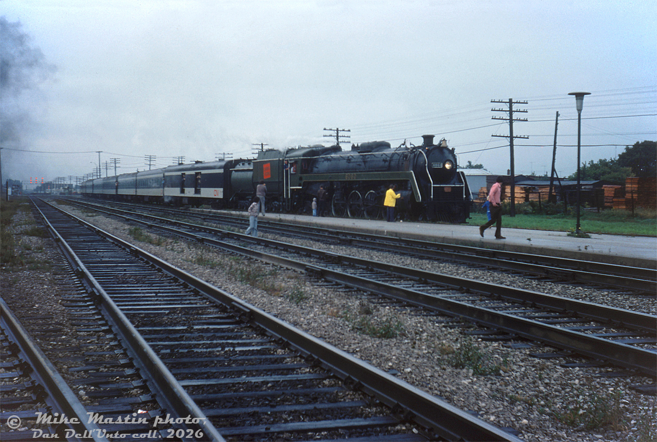 Operating on a fantrip to Peterborough, CNR "Bullet-Nose Beatty" 6060 pauses at Scarborough Junction for a photo-op, before leaving the CN Kingston Sub for the Uxbridge Sub and points east.

Mike MAstin photo, Dan Dell'Unto collection slide.