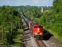 After receiving their written clearance onto the Occupancy Control System (OCS) part of the Galt Subdivision, CPKC train no. 529 eases to a stop at the East Siding Switch Puslinch. Their clearance from J.D. read "clear main track". As RTC has no control over the signals and switches, the conductor will get out and use a pushbutton to activate the switch. Once its in position they'll get a restricting signal into the unsignalled siding. After the last car clears the switch will automatically return to normal and return to clear signals for the train they're meeting.
This system has been around for decades and is slowly being upgraded to CTC in nearby areas. Soon written instructions will be a thing of the past. For now it's great for listening in, getting info for trains and meets. Soon this will be a bygone era in the new age of railroading.
