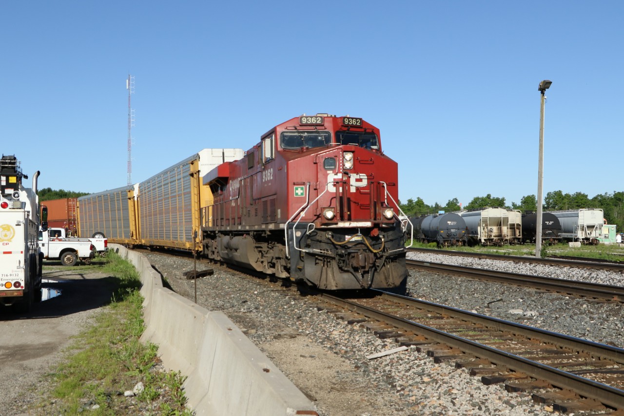 After climbing the hill from Hamilton, this GE ES44AC is seen rounding the curve at Guelph Junction to continue on it's way eastbound. Trailing at the back end was Kansas City Southern 4197, an EMD SD70ACe. A real mix of railcars in tow. Early morning at Guelph Junction can produce some real good photo opportunities for anything eastbound. Hamilton departures that head E/B pass by about ten feet from where you can park your car and watch.