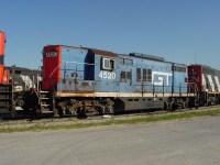 Torpedoes away! 9/5/2001 GTW "Torpedo boat" 4520 is the middle unit of my consist getting ready to depart Oshawa, Ont after making a lift of cars from the  General Motors auto plant in Oshawa. I can't tell the road number from this photo, but the lead unit is either a MLW 630 or 636. While my trailing unit is the ubiquitous GP40-2W #9519