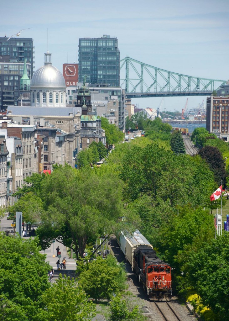 CN 500 is exiting the Port of Montreal with four hoppers.